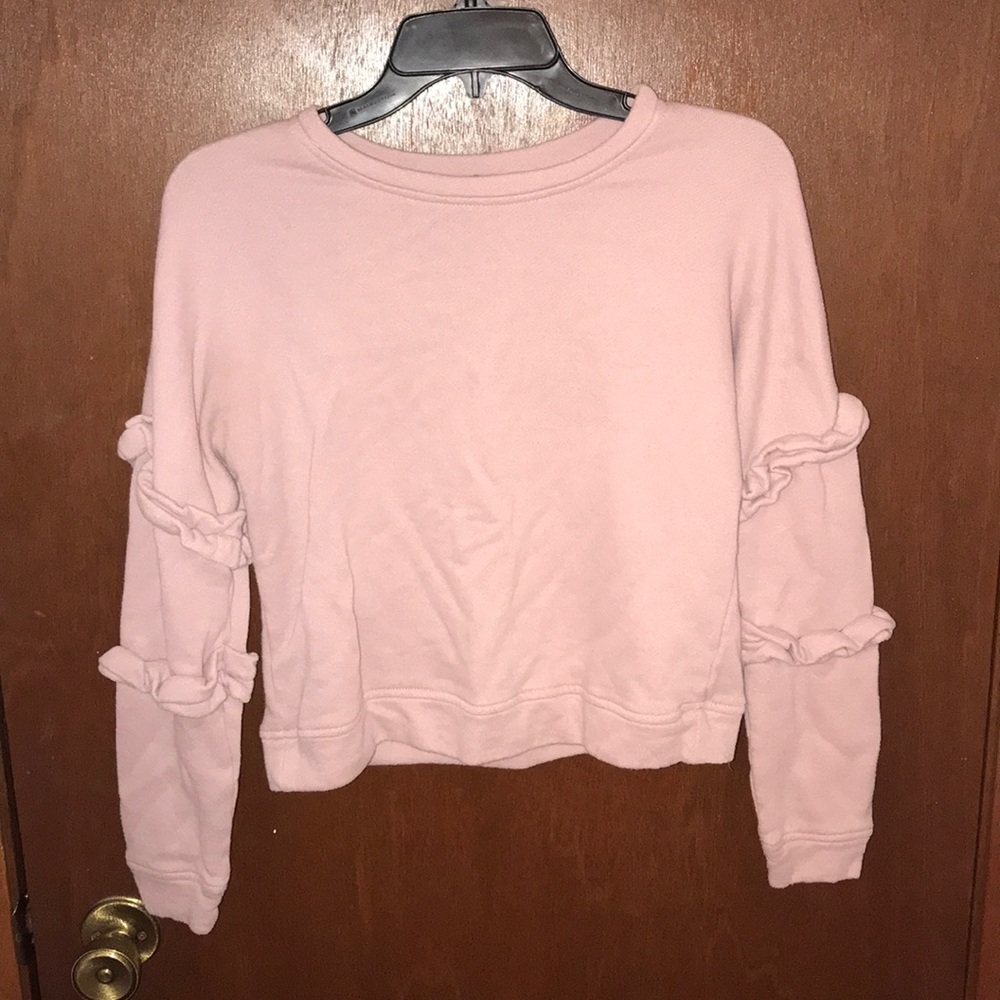 Long sleeved shirt with side ruffles